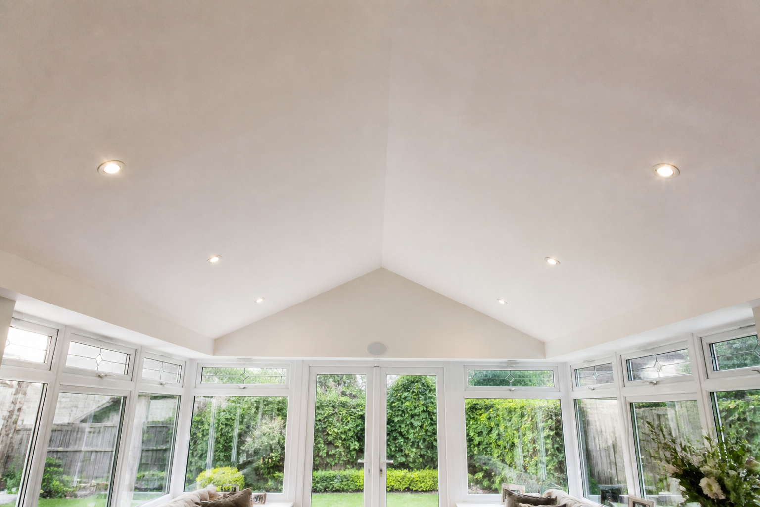 A close-up of the interior of a SupaLite™ insulated warm-roof system, showcasing its neat finish and integrated lighting